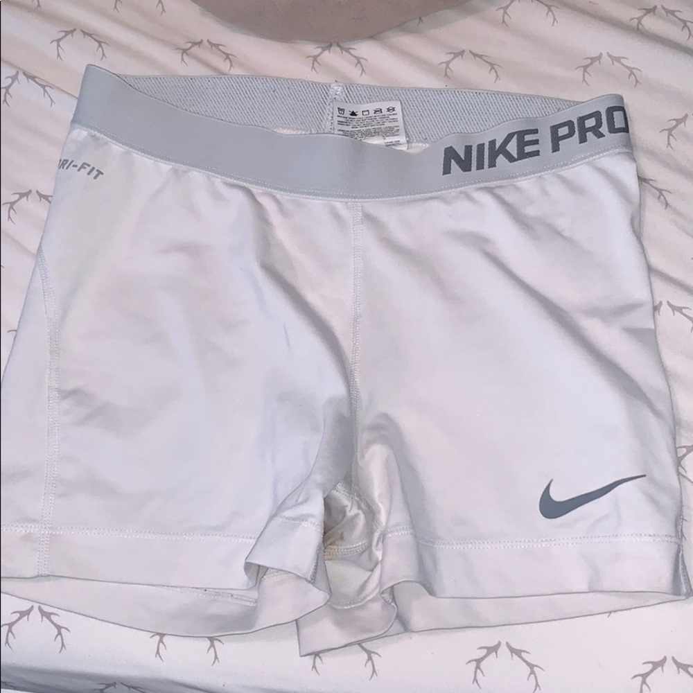 White nike pros